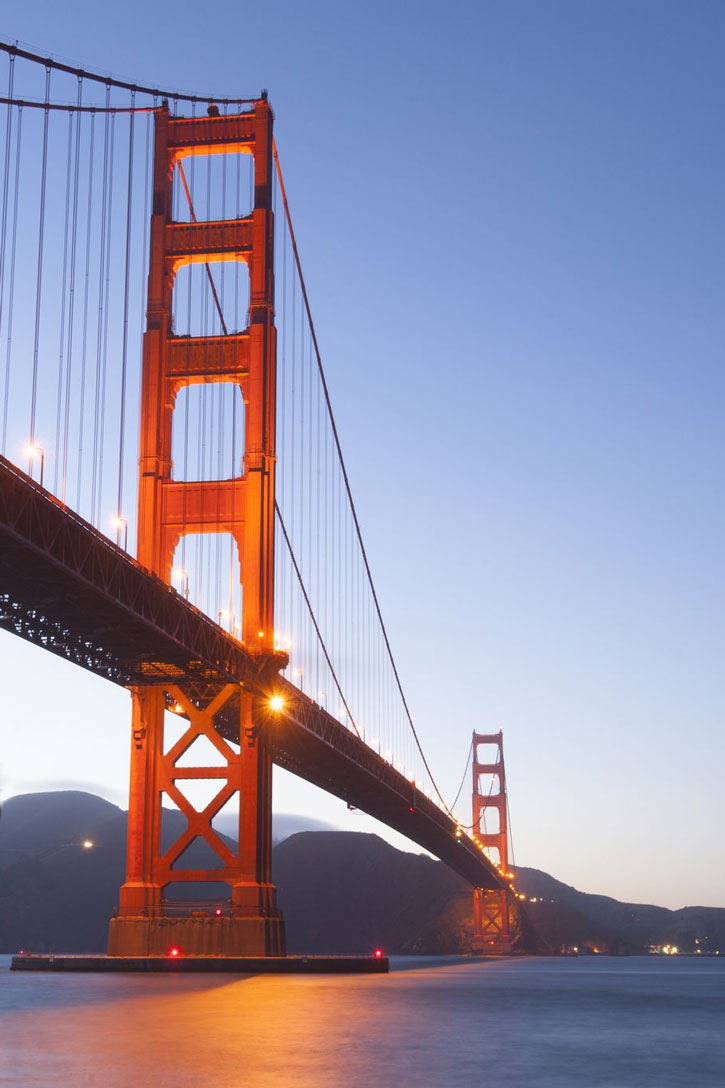 View of the Golden Gate Bridge at dusk.