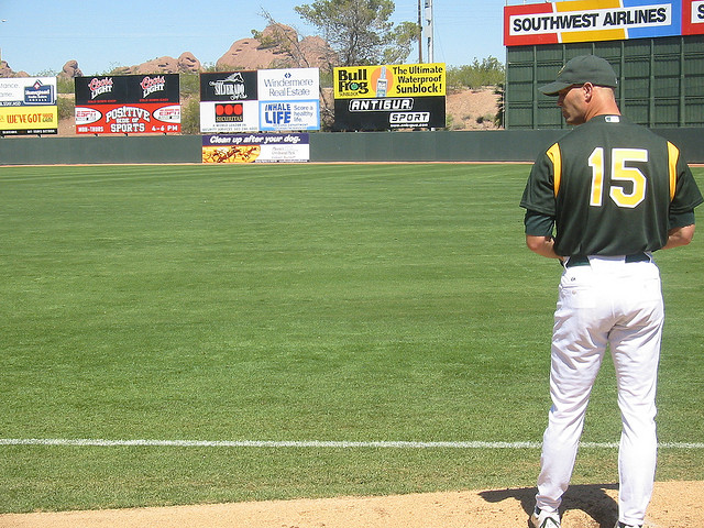 Taken in 2004, Tim Hudson warming up on the field during the Oakland A's spring training.