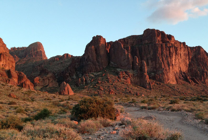 View of the flatiron rise with its sheer red cliffsides.