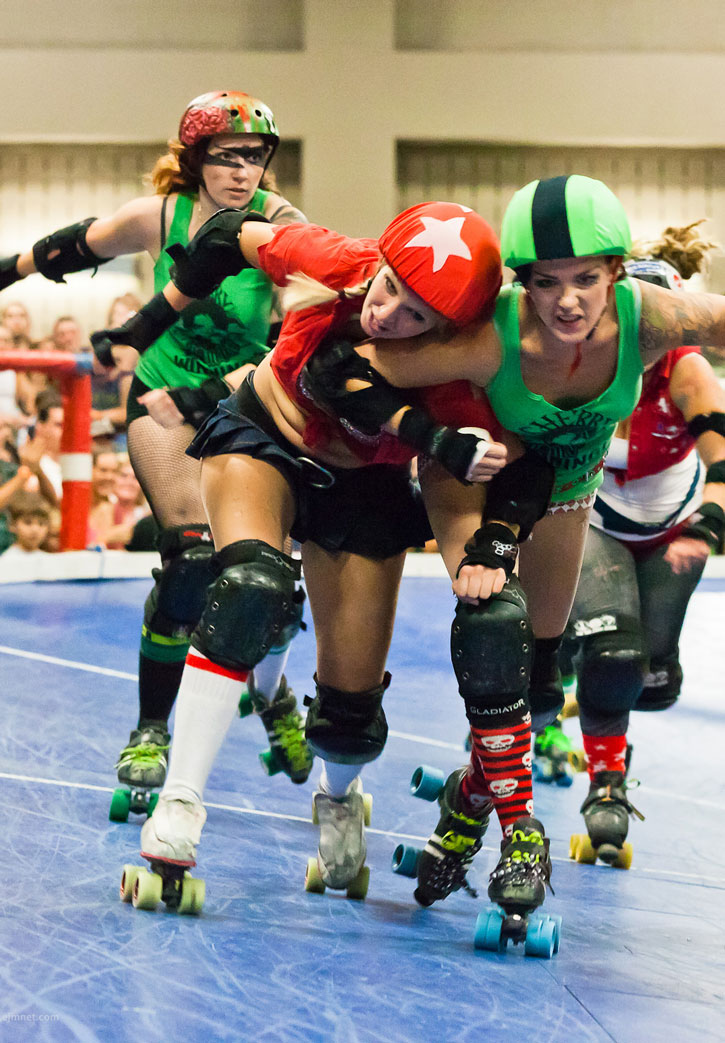 Teams squaring off in Austin's roller derby.