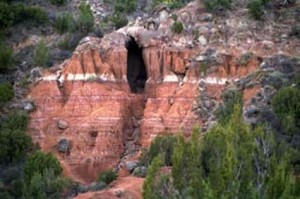 View of a canyon wall with striated rock.