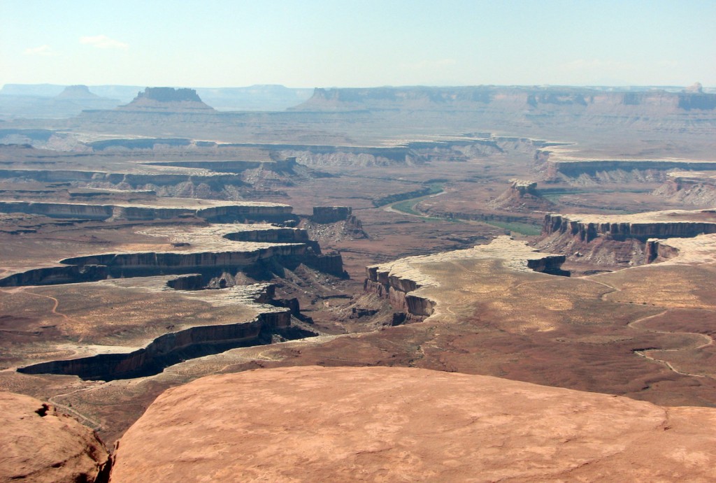 The winding edge of the Island in the Sky mesa as seen from above.