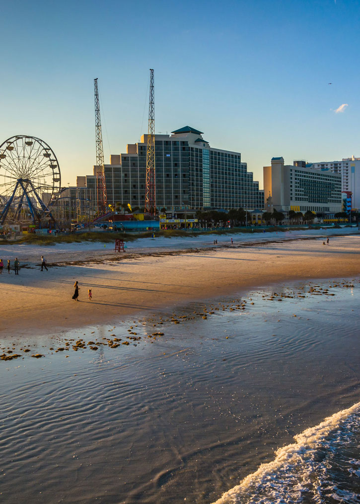 A ferris wheel and beachfront buildings in Daytona Beach, Florida.