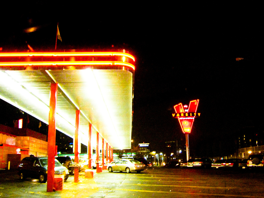 Classic 50s style drive-in architecture with a free-standing V sign.