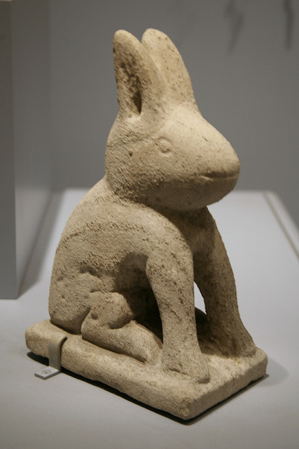 A limestone carved folk-style rabbit sculpture by William Edmonson.
