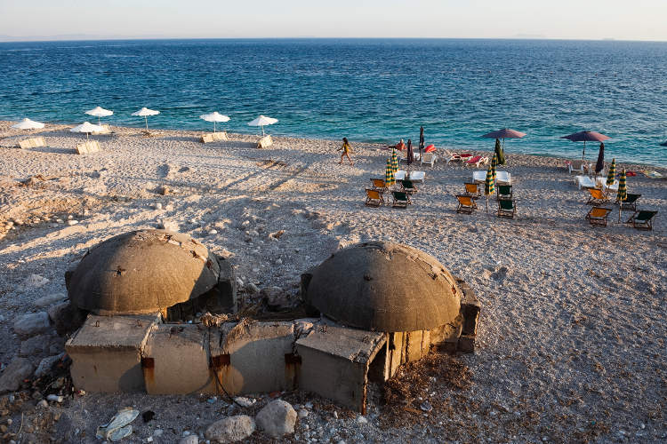 Bunkers on Dhërmi beach. Image by Franz Aberham / Getty Images