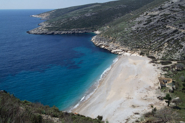 Beach near Vuno between Vlora and Saranda on the Albanian Riviera. Image by De Agostini / Getty Images