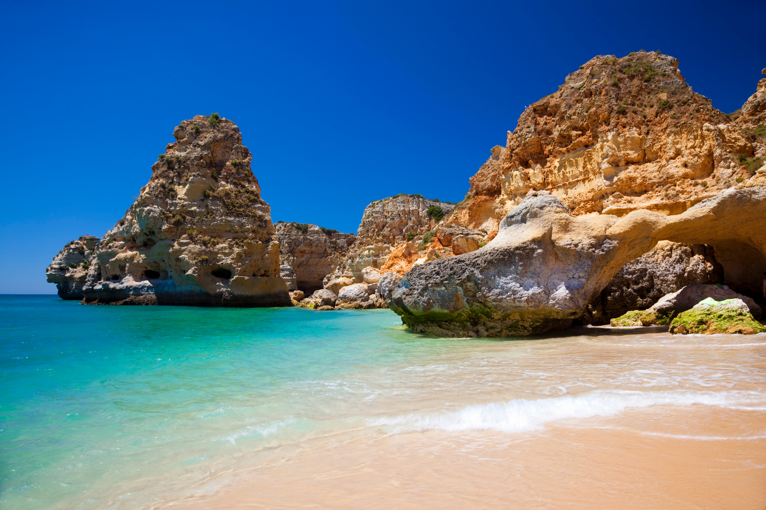 Praia da Marinha: one of the Algarve's best known pin-ups. Image by Lucyna Koch / E+ / Getty