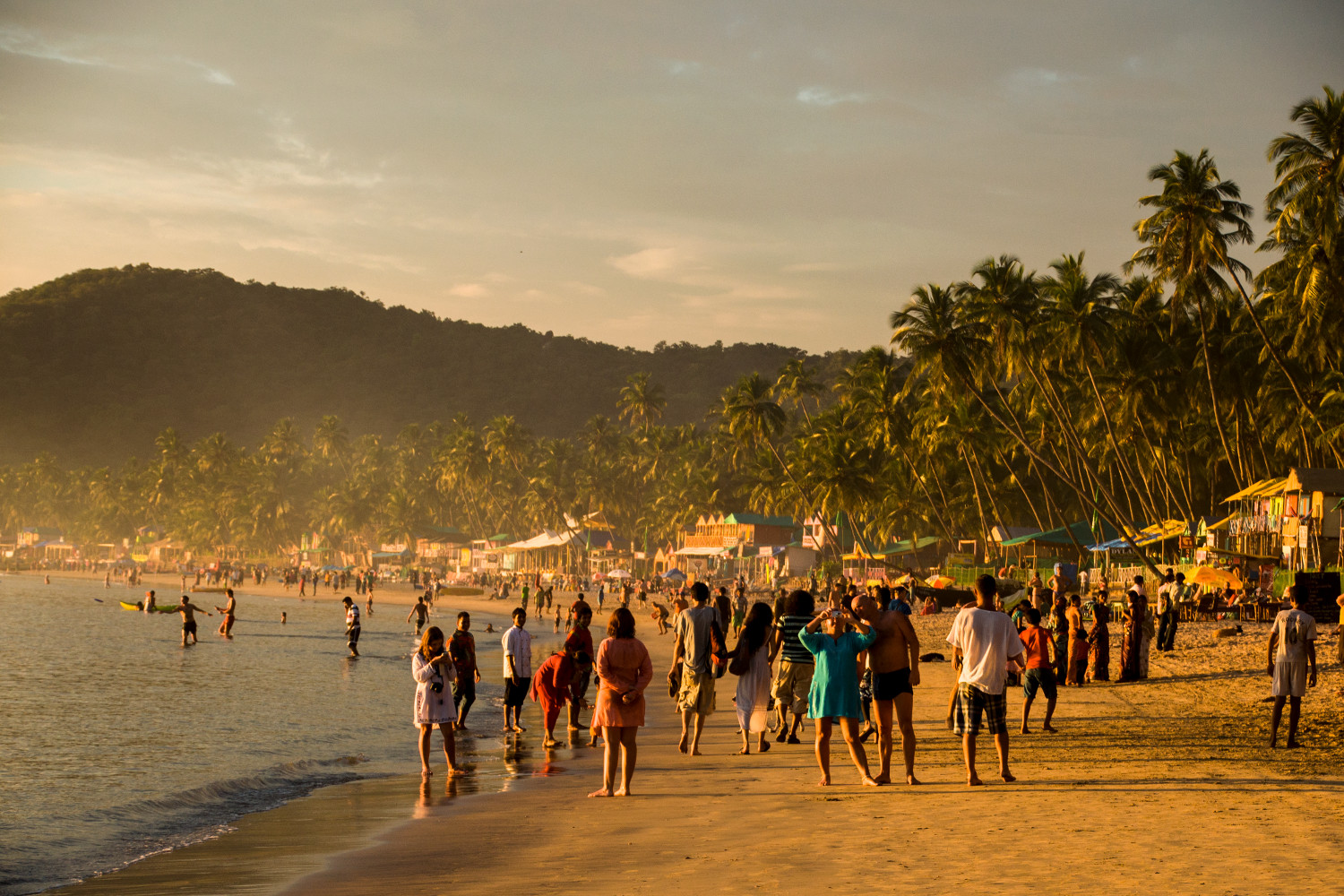 Travellers on Palolem Beach, Goa. Image by Paul Harding / Lonely Planet
