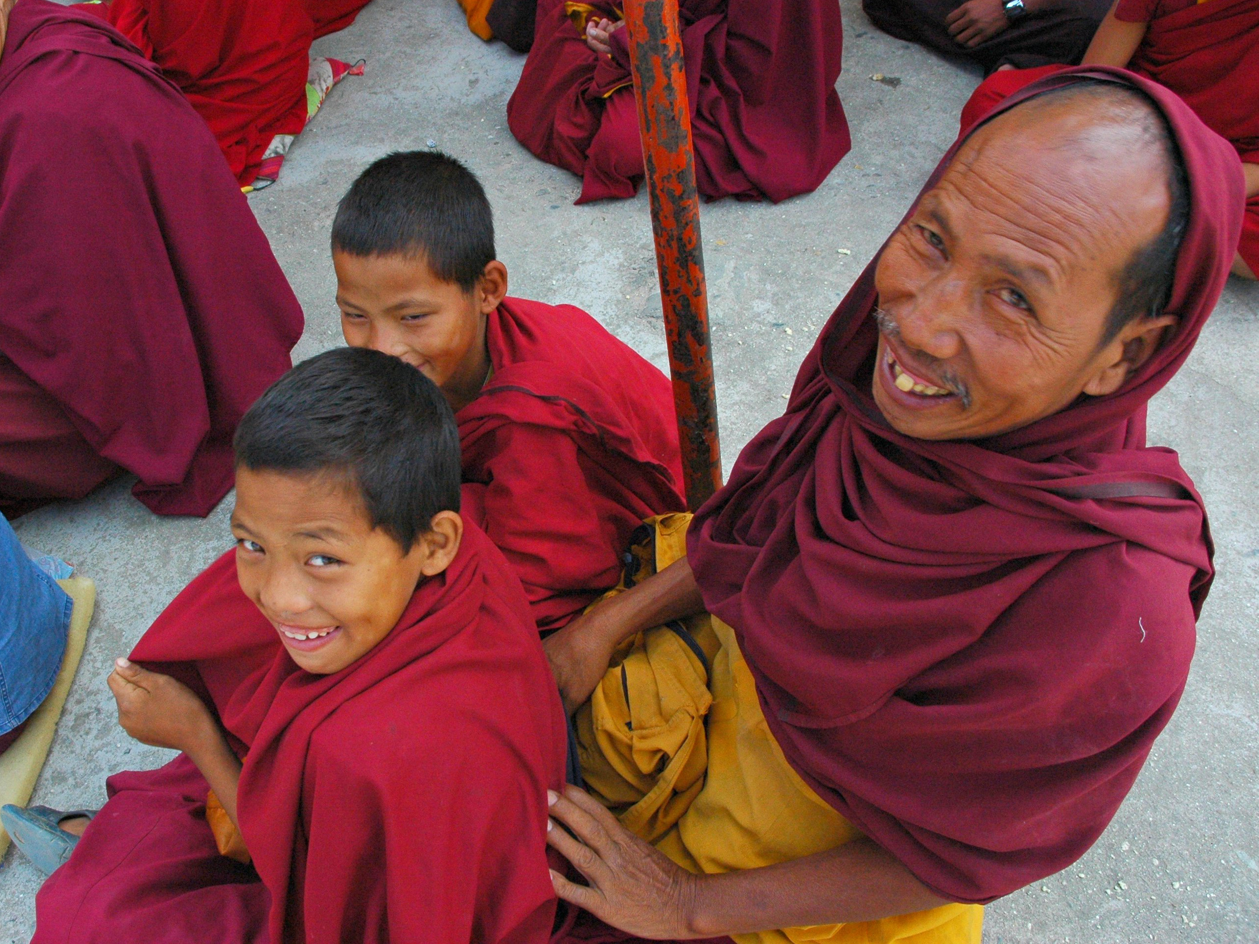 Monks and novices at Tharlam Gompa, Bodhnath. Image by Wonderlane / CC by 2.0