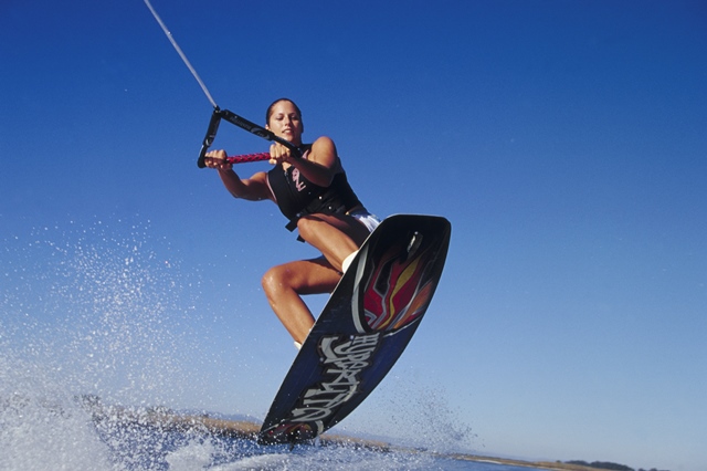 Get wet and wild on a wakeboard. Image by Chris Cole / The Image Bank / Getty