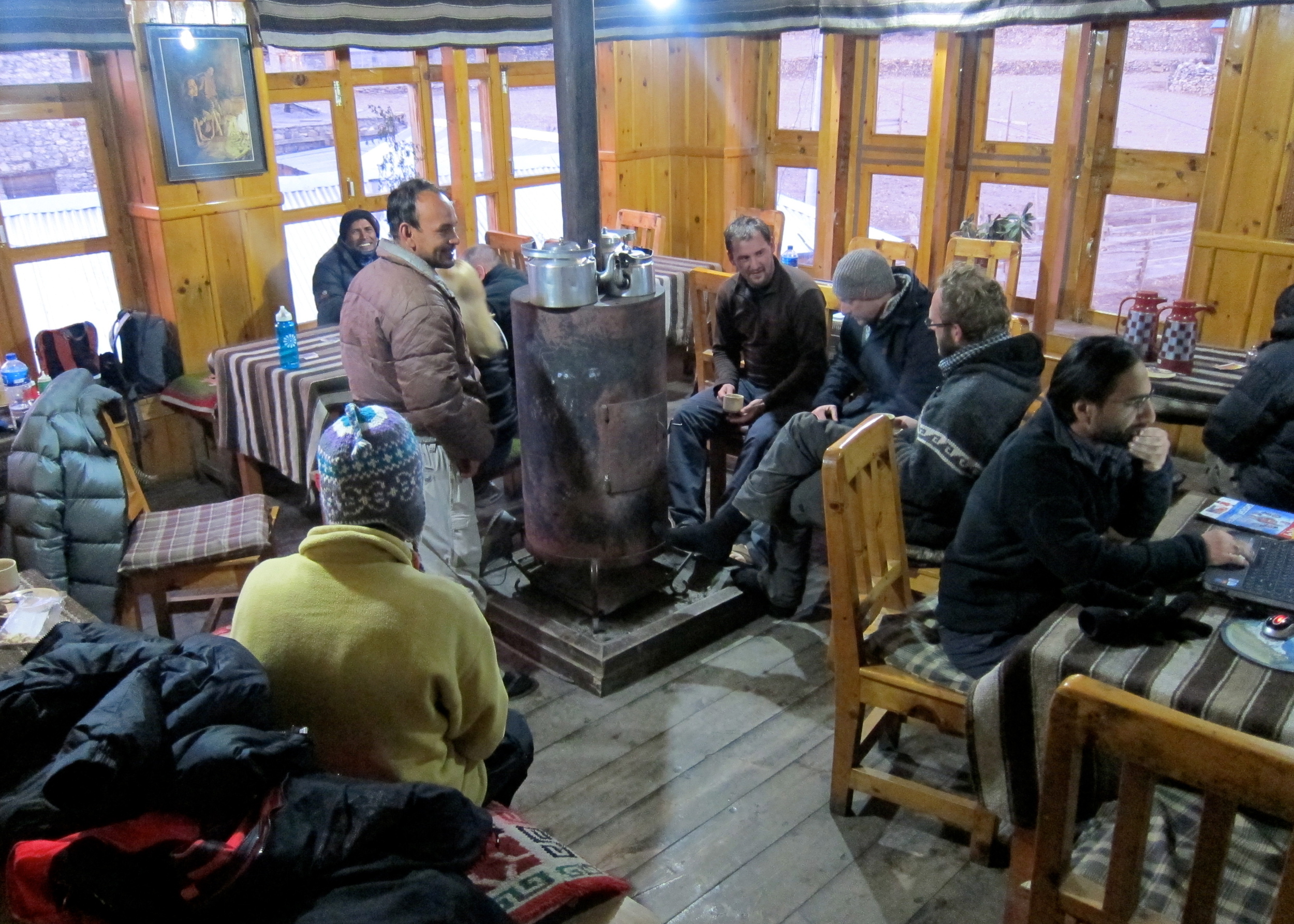 Welcome shelter by the fire on the Annapurna Circuit. Image by Andrew Hyde / CC BY 2.0.