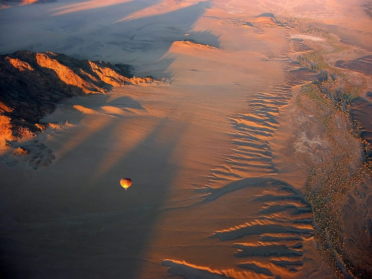 Ballooning over the Namib Desert, Namibia. Image by Joe & Clair Carnegie / Libyan Soup / Getty Images