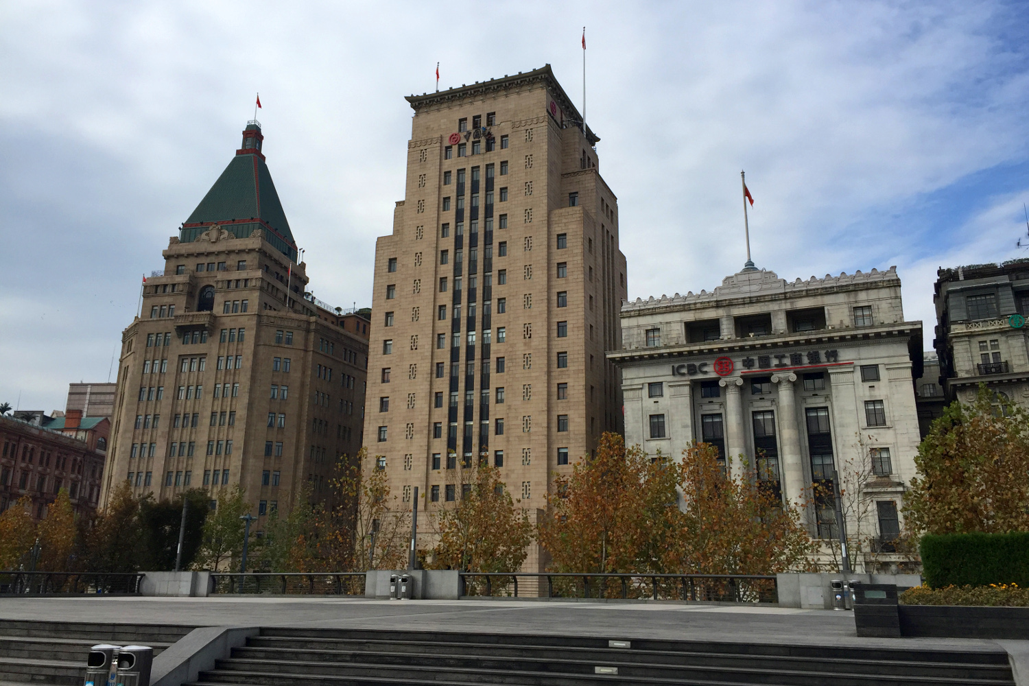 Fairmont Peace Hotel (left) and Bank of China Building (centre) are two of the Bund's art deco masterpieces. Image by Juliana Loh / Lonely Planet