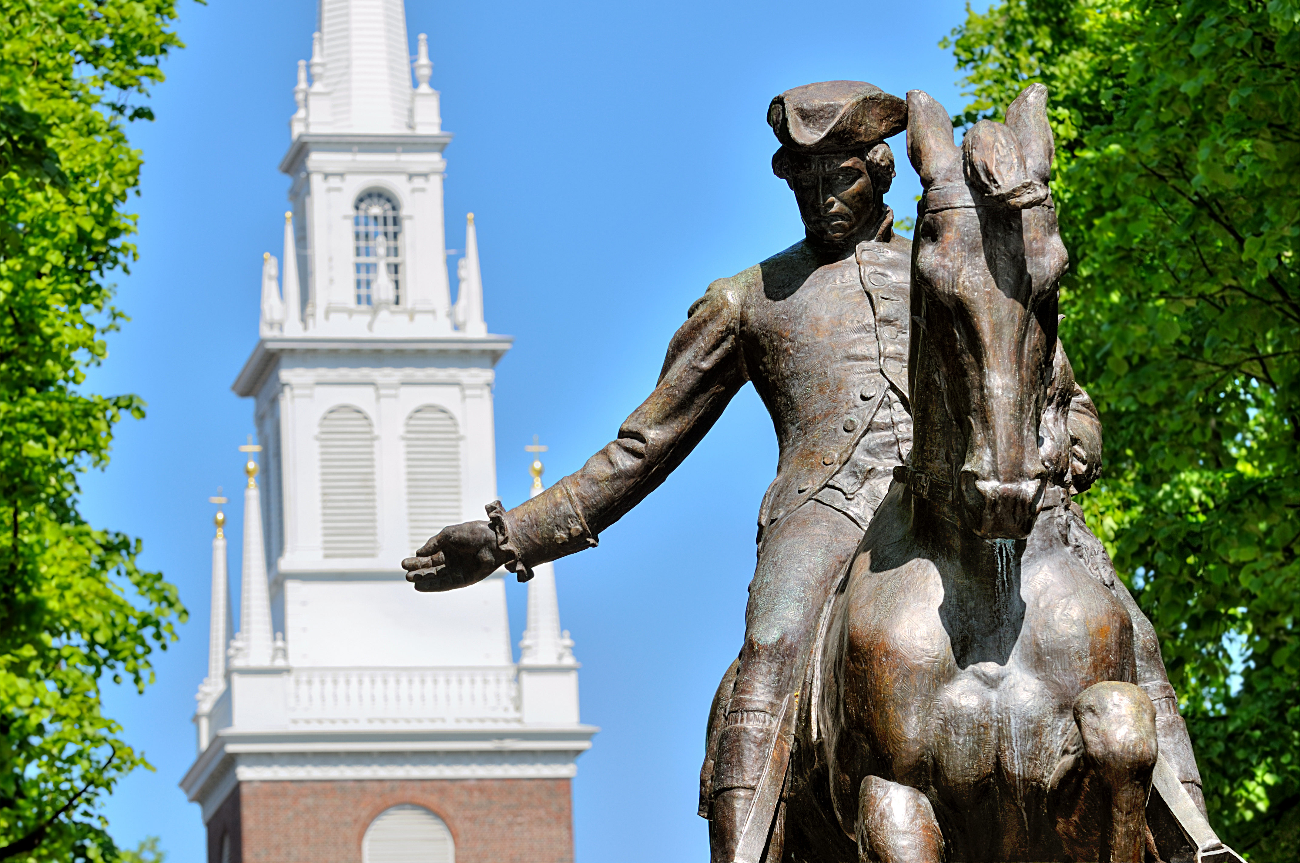 A statue of Paul Revere stands on the Freedom Trail, just outside the Old North Church. Image by Jorge Salcedo / Getty Images