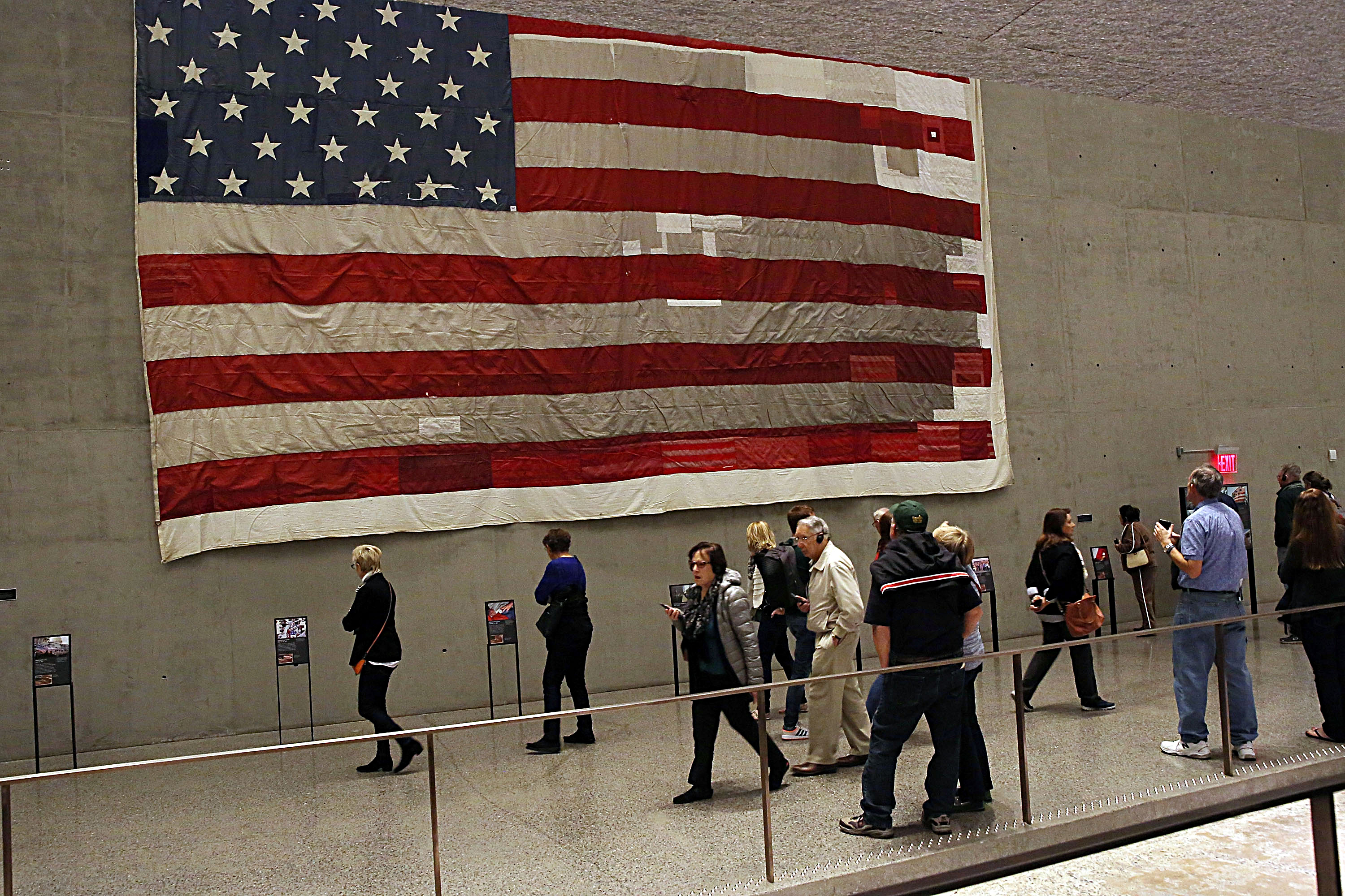 A flag recovered from Ground Zero is one of many poignant exhibits in the September 11 Memorial Museum. Image by Getty Images