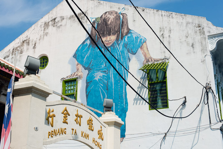 Kungfu Girl, one of the more popular street art pieces in George Town, Penang, by Lithuanian street artist Ernest Zacharevic. Image by Lonely Planet