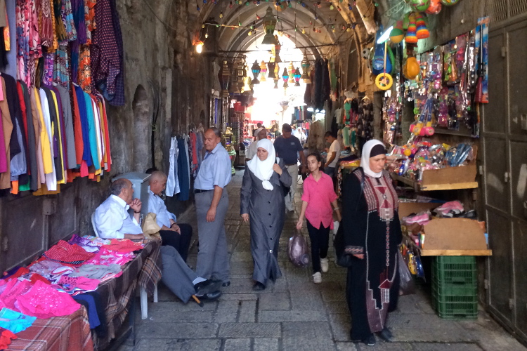 Atmospheric streets lined with stalls are a big draw in the Muslim Quarter. Image by Virginia Maxwell / Lonely Planet