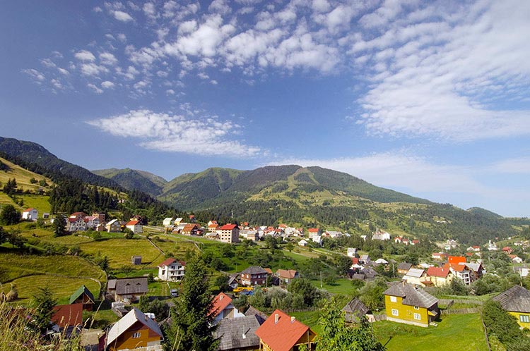 Romania's rolling Rodna Mountains and pastel-coloured villages enchanted writer William Blacker. Image by Gregory Wrona / Getty Images