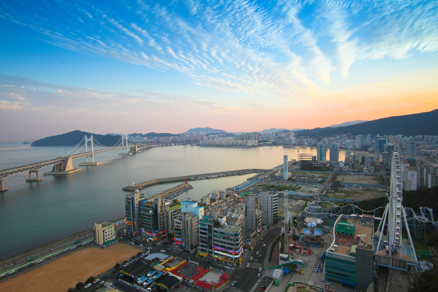 Busan's Gwangalli Beach at sunset. Image by JS`s favorite things / Getty