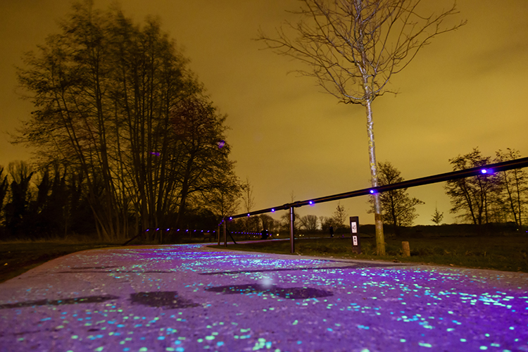 An illuminated cycle path in Nuenen inspired by Van Gogh's Starry Night
