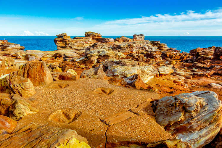 Dinosaur footprints at Broome's Gantheaume Point. Image by Michael Garner / iStock / Getty Images