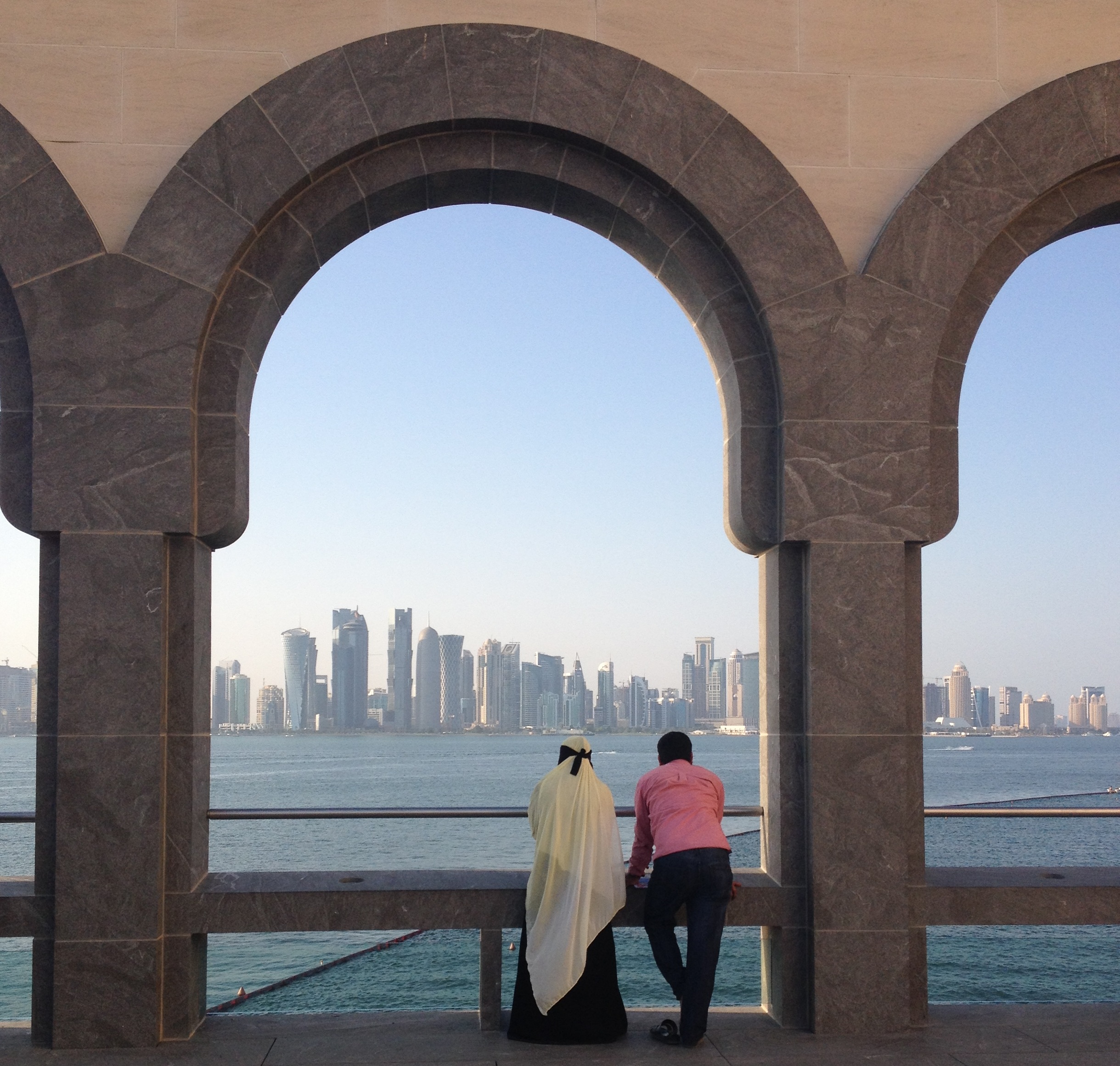 A couple admire the Doha skyline from outside the Museum of Islamic Art