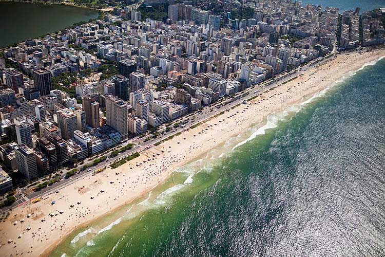 Fancy a dip? An aerial view of the Zona Sul neighborhoods of Ipanema and Leblon along the coast in Rio de Janeiro, Brazil. Image by Lianne Milton / The Image Bank / Getty Images