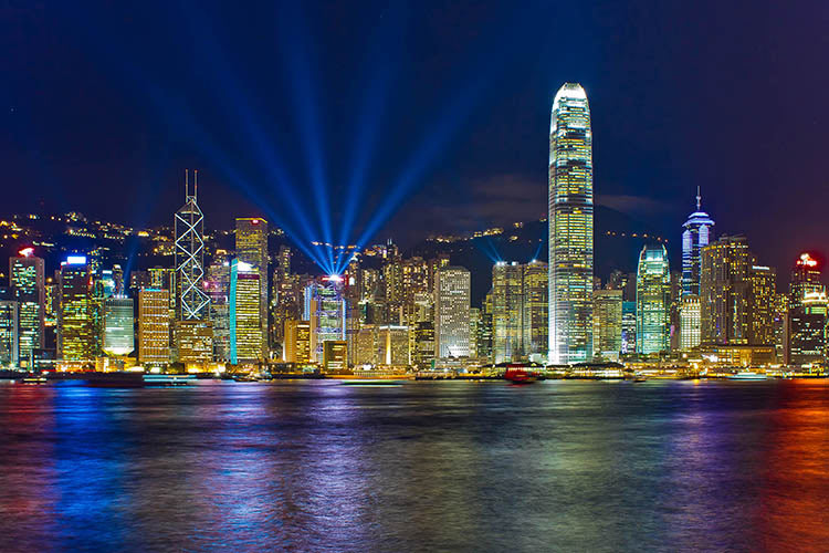 Squint at the psychedelic Symphony of Lights on one of Asia's most futuristic skylines. Image by Sunnyha Images / Monument Open / Getty Images