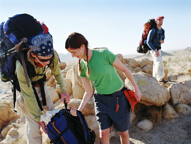 Backpacks at the ready in California's Mojave Desert. Image by Ken Chernus / Taxi / Getty Images.