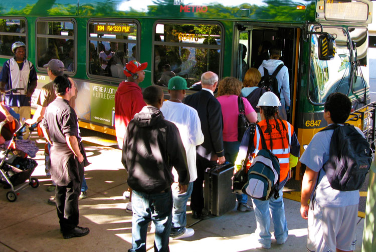 Queuing for an airport bus, the final hurdle! Except of course that six-hour wait to check in at the hotel. Image by Oran Viriyincy / CC BY-SA 2.0.