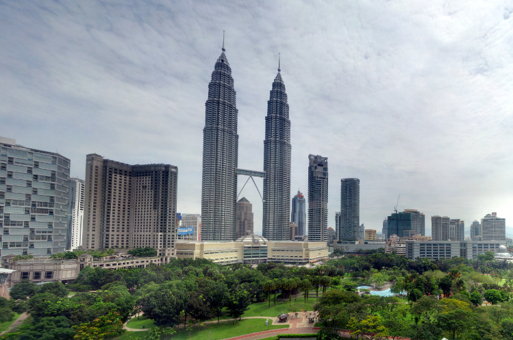 The KL Towers are a stunningly sci-fi backdrop to verdant KLCC Park, seen here from the Traders Hotel. Image by Robert Lowe / CC BY 2.0
