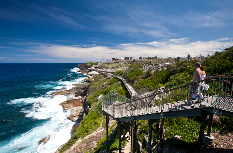 Walkers on the Bondi to Coogee Walk approaching Waverly Cemetery. Image by Lindsay Brown / Lonely Planet Images / Getty Images.