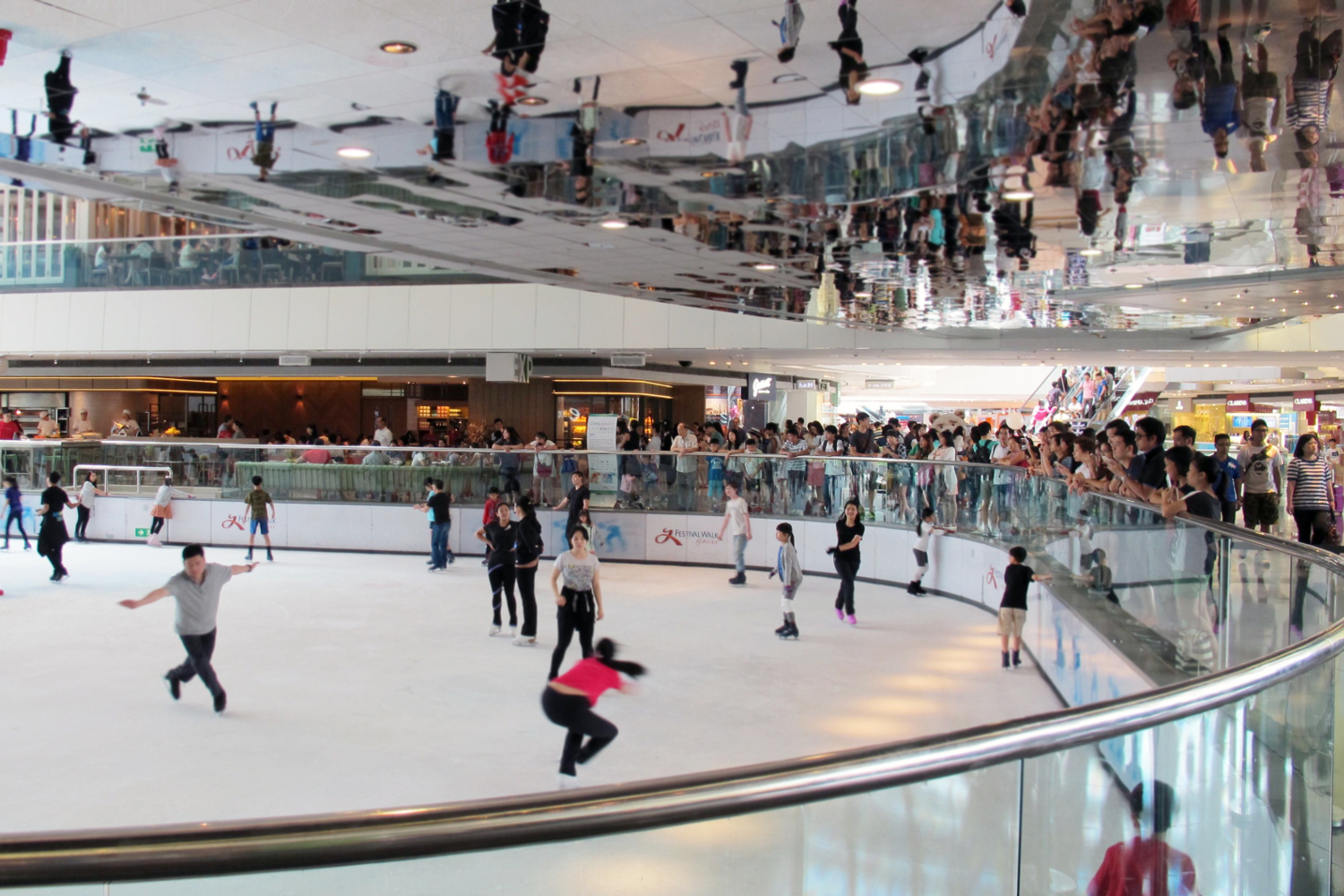 Skating under mirrors at Glacier, Festival Walk. Image by Tom Spurling / Lonely Planet