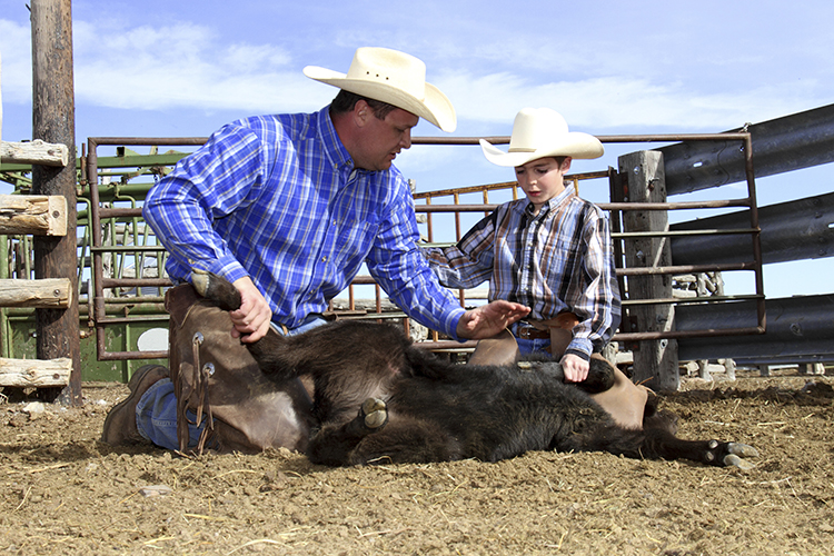 Who knows what skills your kids might learn after a week on the ranch? Image by Brandy Taylor / E+ / Getty Images