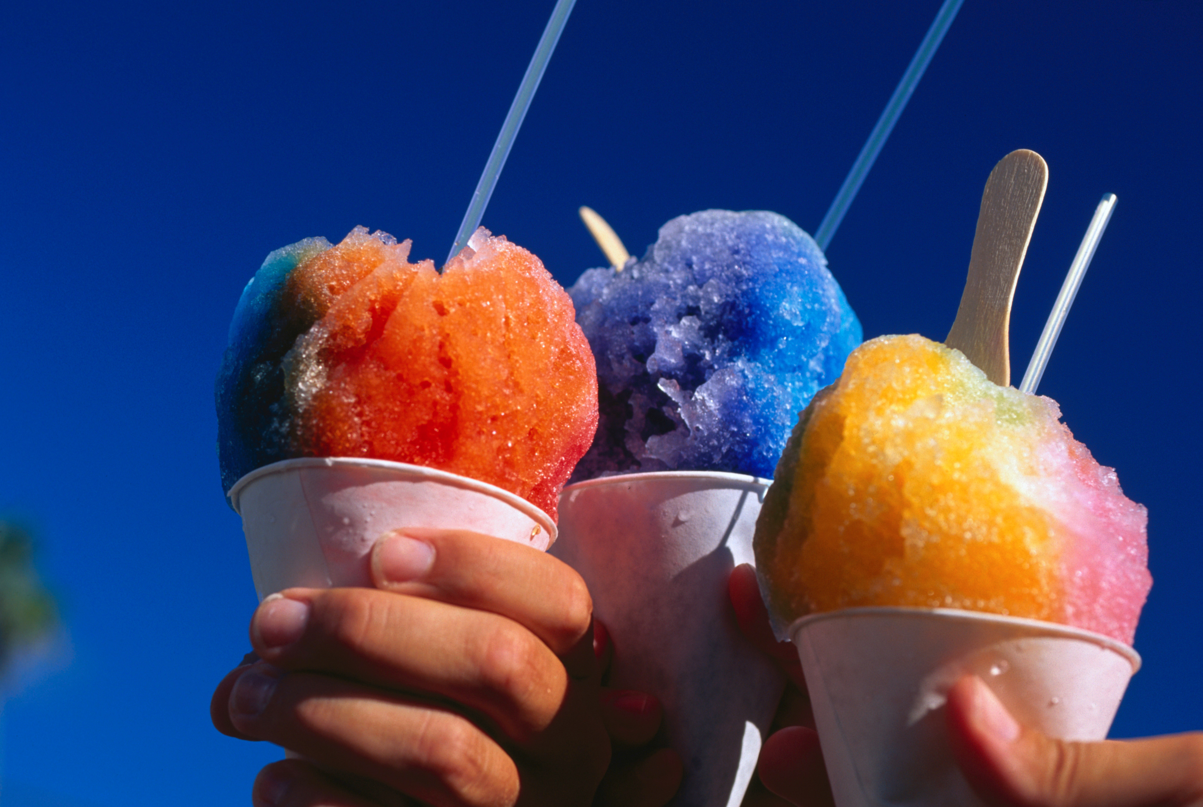 Shave ice is the perfect way to cool off after a long day of outdoor adventures in Kauaʻi. Image by Ann Cecil / Lonely Planet Images / Getty