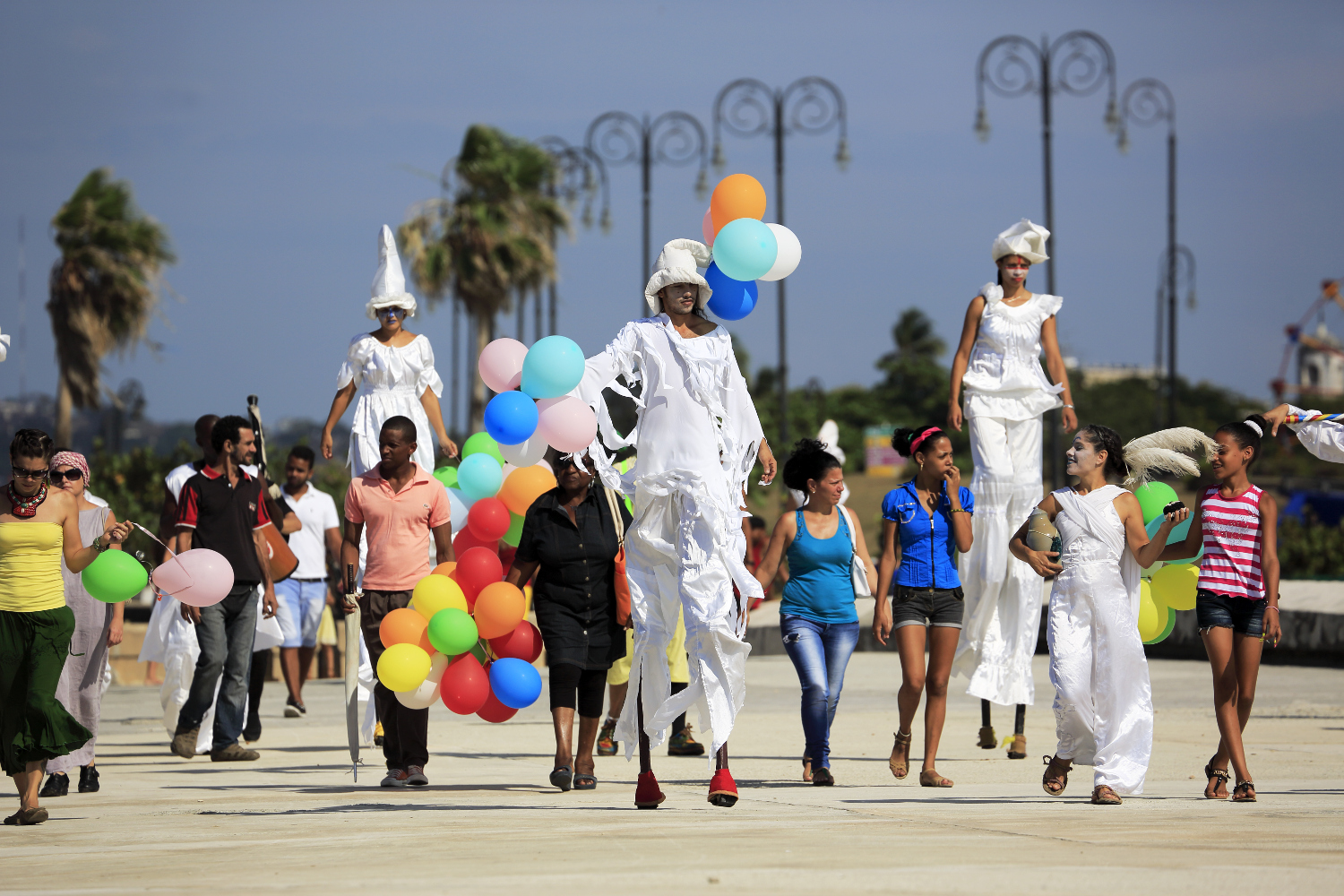 Theatrical performers on stilts will bamboozle the kids in dreamy Havana. Image by Bruce Yuanyue Bi / Lonely Planet Images / Getty