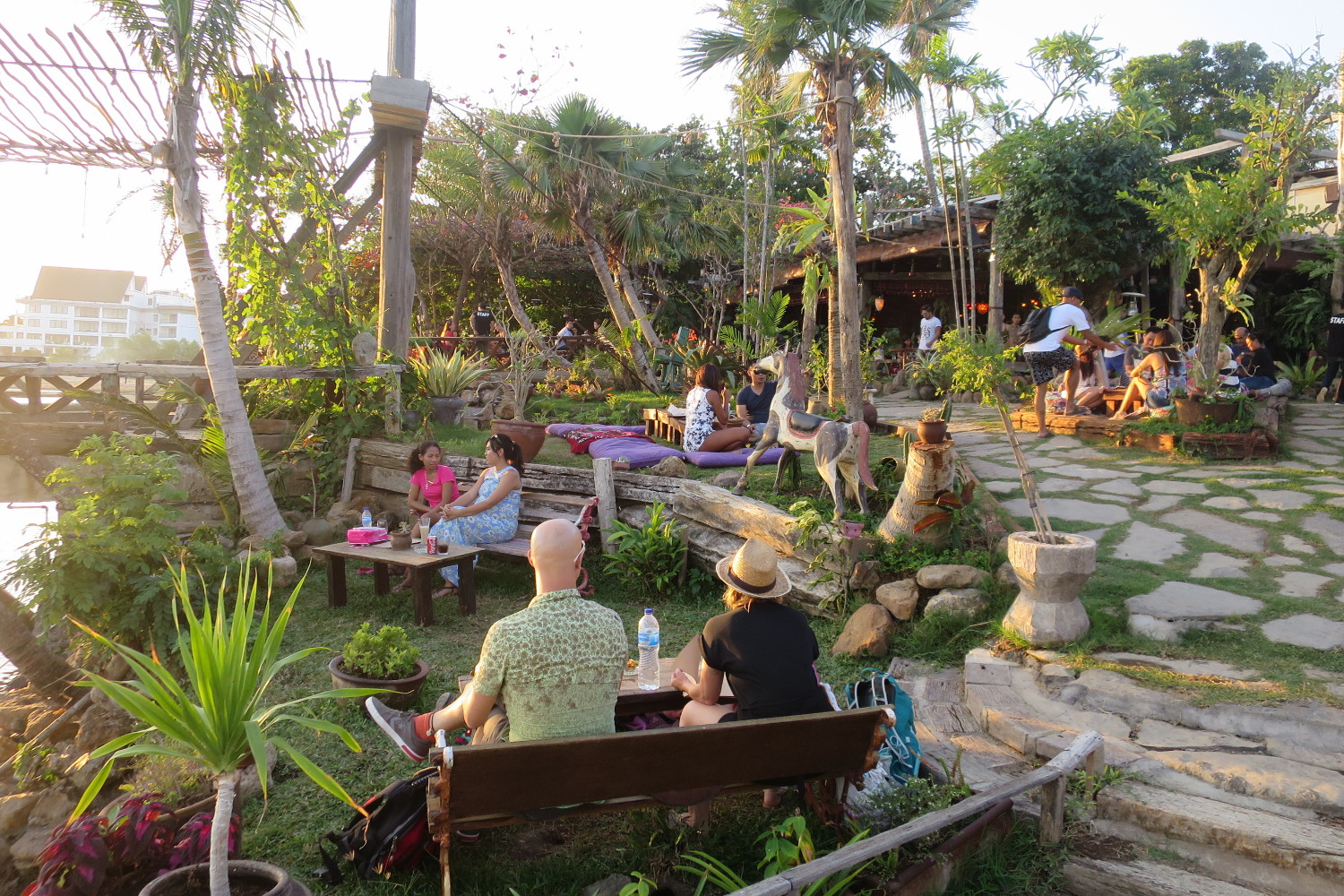 Barflies catch the sunset at La Laguna bar, Bali © Sarah Reid / Lonely Planet