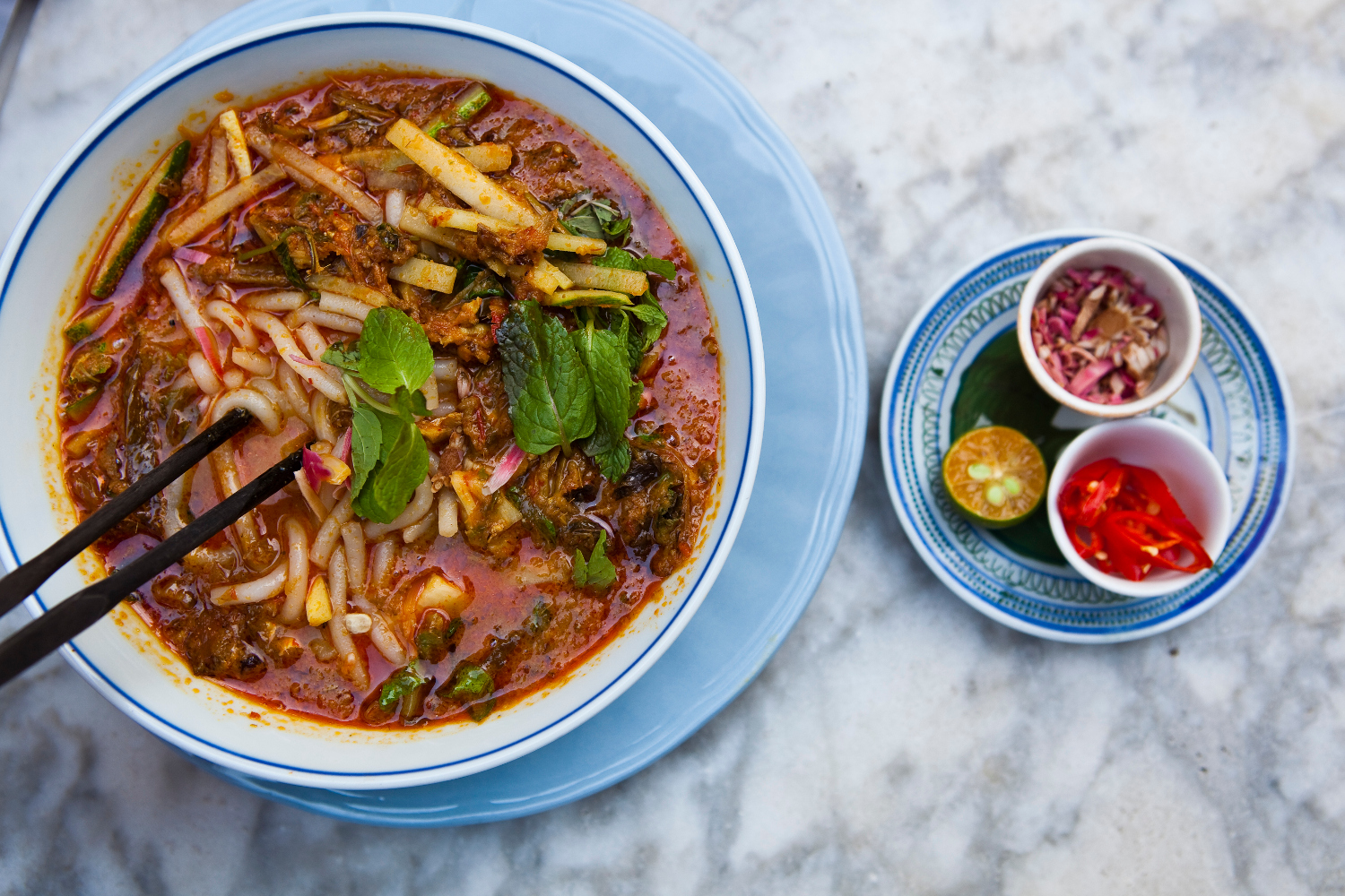Asam laksa at Mews Cafe in George Town, Penang © Richard l’Anson / Lonely Planet Images / Getty Images