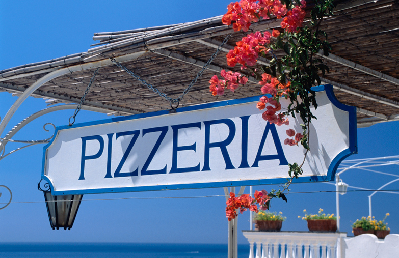 Pizzeria sign in Positano, Italy. Image by Dallas Stribley / Lonely Planet Images / Getty Images.