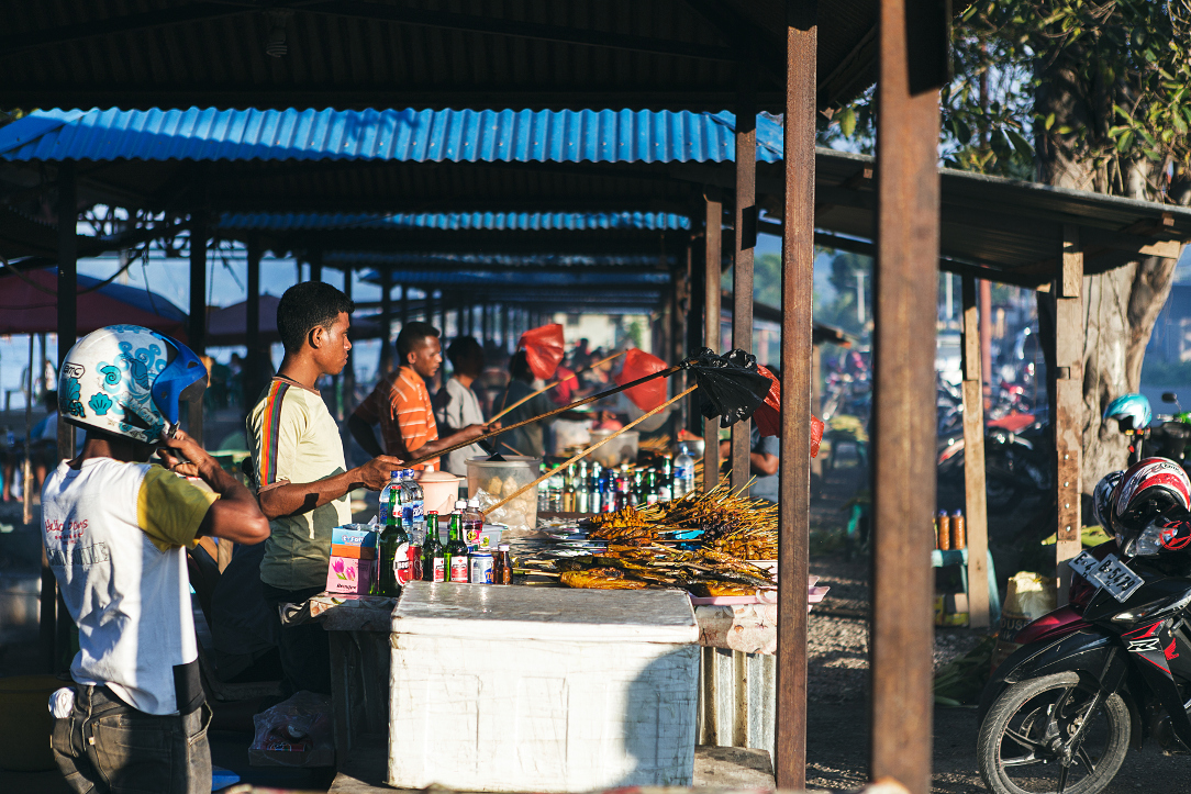 Fish on a stick stalls, Dili. Image by Brian Oh / Lonely Planet