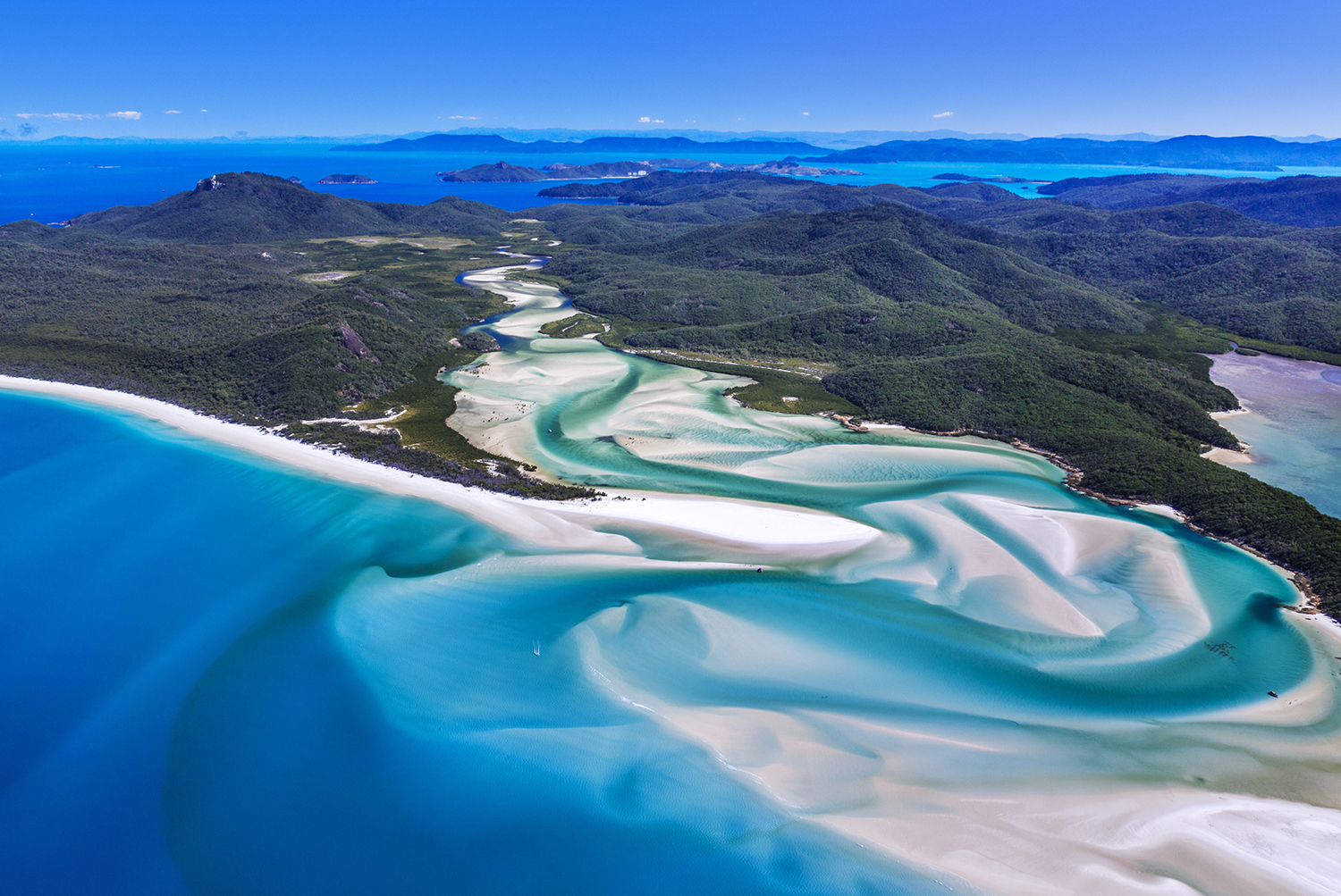 Paradise found: an aerial view over Whitehaven Beach in Queenland's Whitsunday Islands. Image by Yoshio Tomii / Getty Images