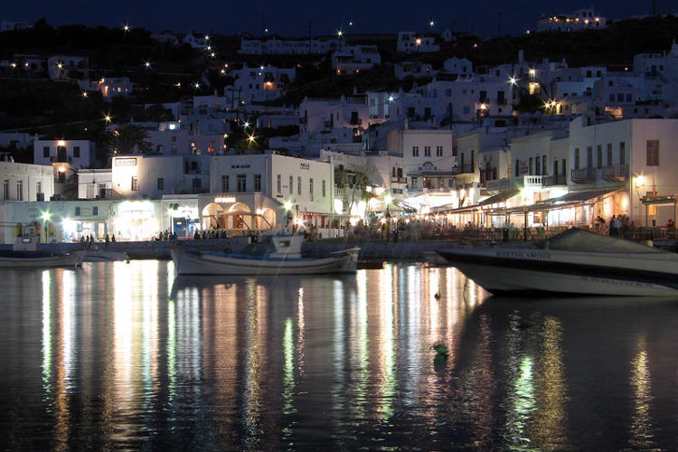 Hip Mykonos’ waterfront by night. Image by Allan Henderson / CC BY 2.0