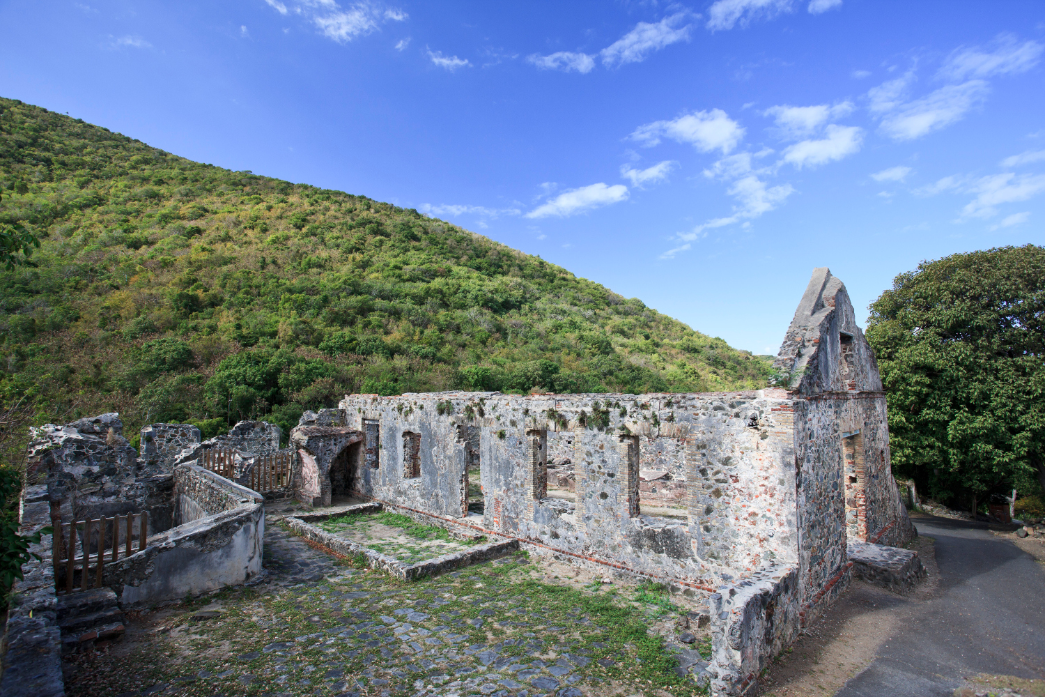 Crumbling sugar mill ruin on St John, Virgin Islands National Park. Image by Michele Falzone / AWL Images / Getty