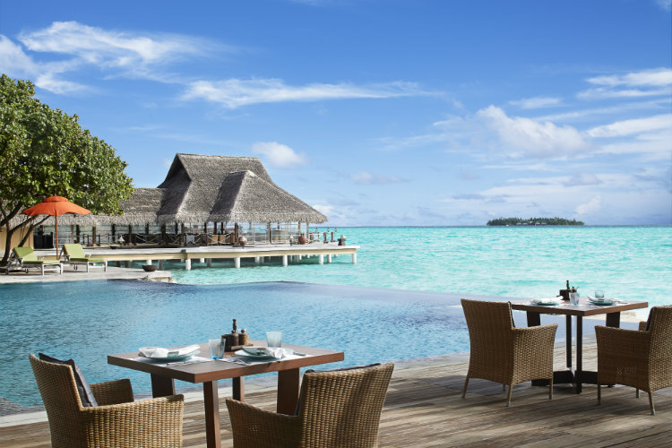 View of infinity pool and ocean from Taj Exotica hotel bar