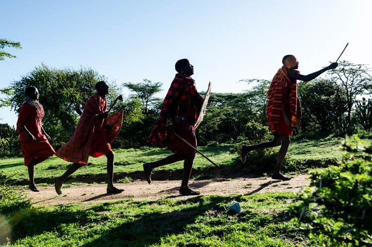 Celebrating after 'warrior training'. Image by Michael Benanav / Lonely Planet.