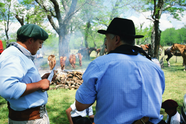 Gauchos at barbecue in Argentina