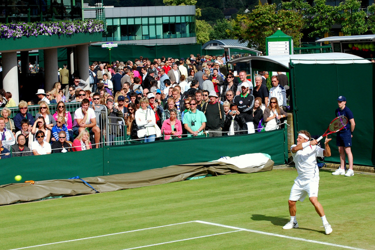 David Nalbandian in action at Wimbledon. Image by Kate / CC BY-SA 2.0