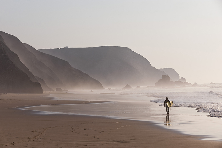 Winter brings the best waves to Portugal's western Algarve. Image by Westend61 / Brand X Pictures / Getty Images 