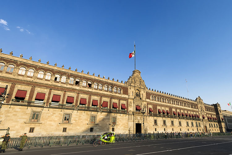 Mexico’s City’s Palacio Nacional, the focus of the Grito de Dolores. Image by Daniel Sambraus / Photographer’s Choice / Getty Images